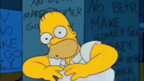 Homer (from the simpsons) with his tongue out and babbling, from a Shining spoof. Behind him scrawled all over the walls it says "no tv and no beer make homer go crazy" multiple times