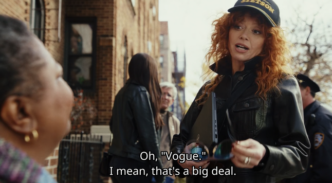 Charlie Cale (Natasha Lyonne) from Poker Face talking to a woman in NYC. The woman had just explained that she was a managing editor of a magazine. Charlie responds, saying, "Oh 'Vogue.' I mean, that's a big deal.'