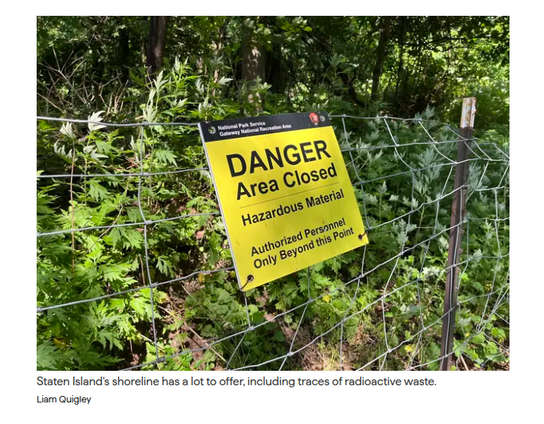 An image from the article of a wire fence (with wild forest behind it), containing a bright yellow sign that reads "DANGER Area Closed. Hazardous Material. Authorized Personnel Only Beyond This Point."

The caption under the image reads, "Staten Island's shoreline has a lot to offer, including traces of radioactive waste."